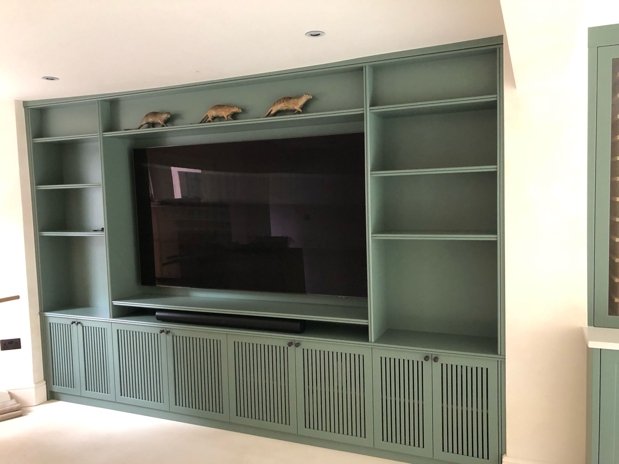 Bespoke Media Unit with integrated LED lighting and joinery in Kensal Rise